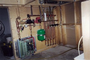 electrical on demand heater with a distribution manifold