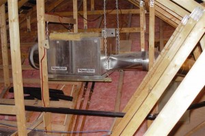 Mini duct chilled water air handler mounted in the attic